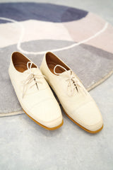 Cream canvas lace up shoes