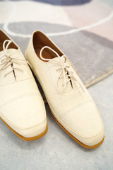 Cream canvas lace up shoes