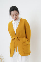 Orange knit jacket w/ waist strap