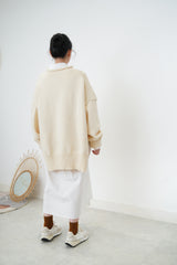 Ivory oversize sweater in split hem