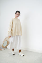 Ivory oversize sweater in split hem