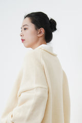 Ivory oversize sweater in split hem