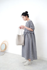 Grey leather tote in round thin strap