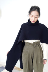 Dark navy funnel neck cape in 2 ways