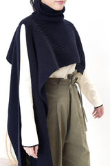 Dark navy funnel neck cape in 2 ways