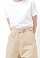 Beige trousers in detail waist strap