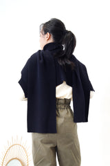 Dark navy funnel neck cape in 2 ways