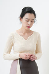 Ivory wavy v neck top
