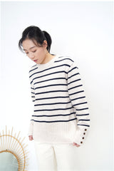 Stripe pattern sweater w/ buttons sleeves