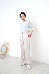 Light grey trousers in flip hem