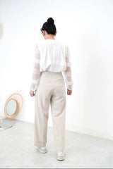 Light grey trousers in flip hem