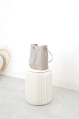 Grey leather tote in round thin strap