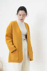 Orange knit jacket w/ waist strap