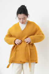 Orange knit jacket w/ waist strap