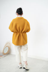 Orange knit jacket w/ waist strap