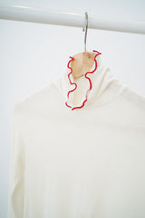 Ivory inner w/ red ruffle fringe