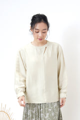 Light grey shirt w/ detail cut out collar