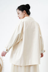 Cream trench coat w/ contrast sleeves