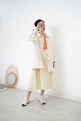 Cream trench coat w/ contrast sleeves