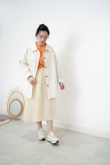 Cream trench coat w/ contrast sleeves