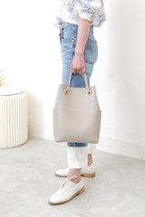 Grey leather tote in round thin strap