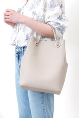 Grey leather tote in round thin strap