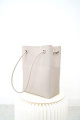 Grey leather tote in round thin strap