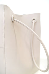 Grey leather tote in round thin strap