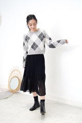 Grey crop cut sweater in diamond print