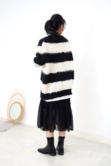 Black stripes oversize sweater in ripped details