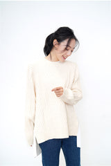 Cream knit top w/ pleats detail back