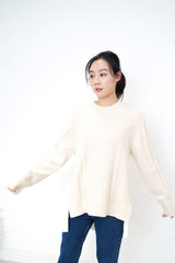 Cream knit top w/ pleats detail back