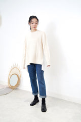 Cream knit top w/ pleats detail back