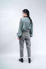 Washed black jeans in pencil cut