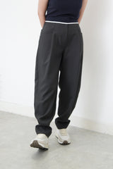 Grey trousers in pencil cut