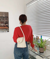 Outlined vintage style leather bag