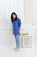 Blue high waist jeans in ripped details