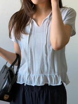 Light blue crochet top w/ peplum hem
