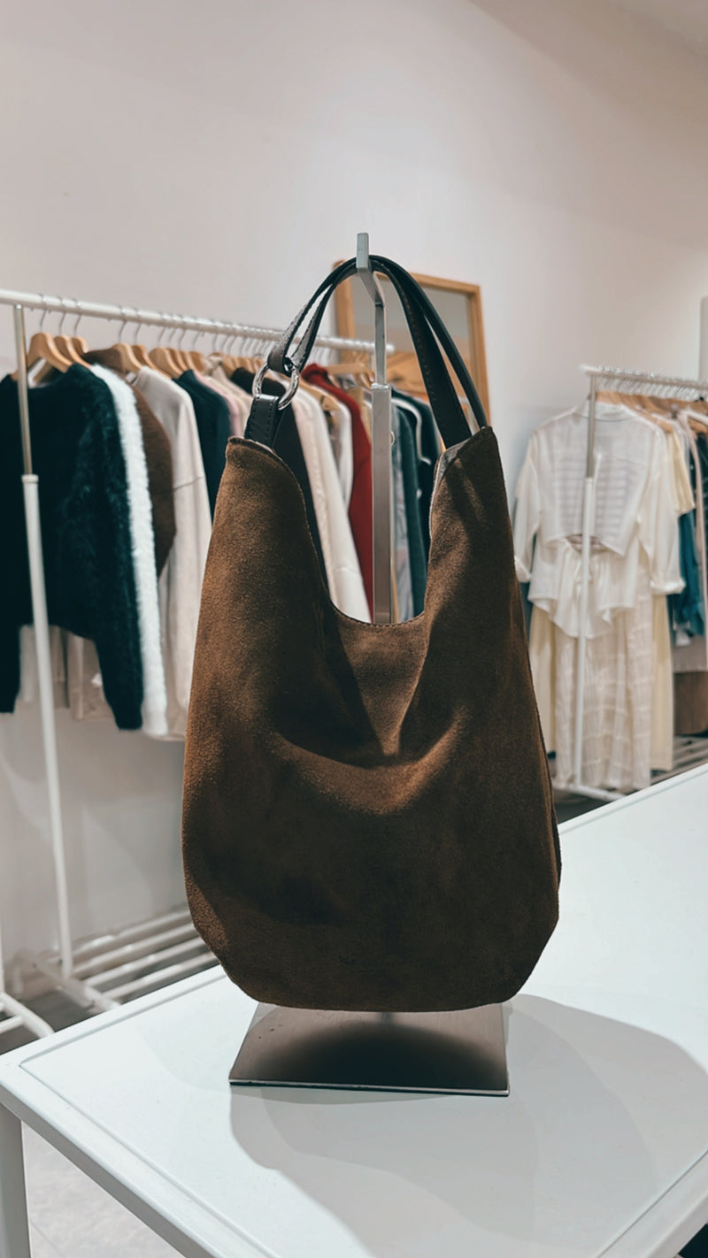 Brown suede bucket bag in 2 ways