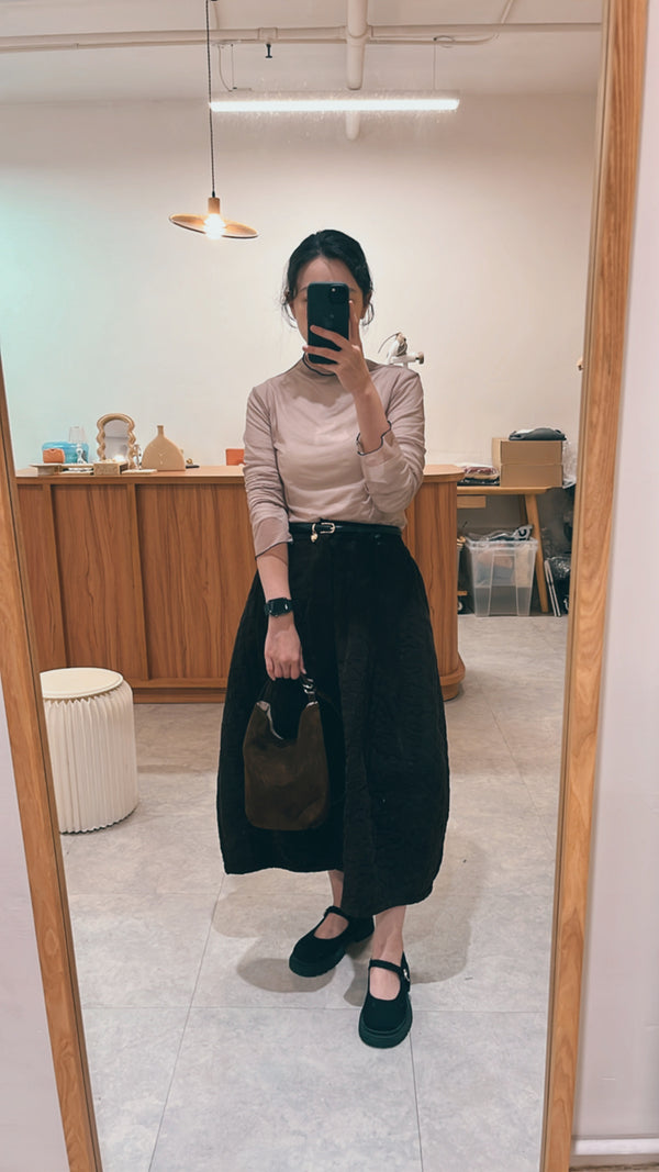 Brown suede bucket bag in 2 ways