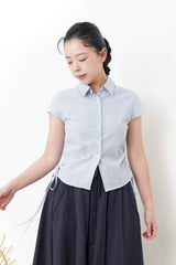 Blue checked shirt w/ string tie