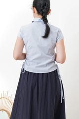 Blue checked shirt w/ string tie