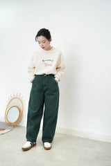 Green wide leg trousers w/ outline stitching