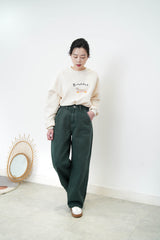 Green wide leg trousers w/ outline stitching