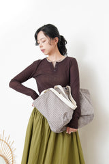 Brown button top in contrast layer
