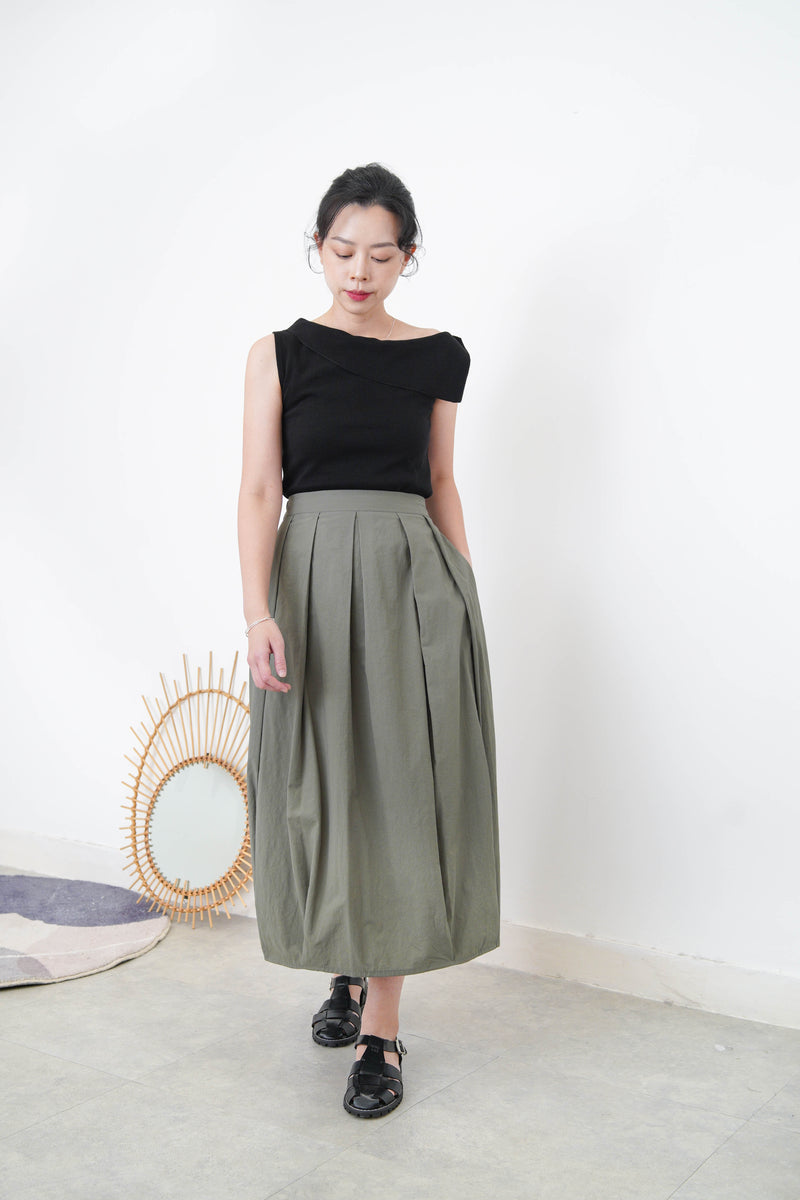 Black flipped layer vest in asy. Cut