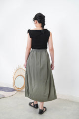 Black flipped layer vest in asy. Cut