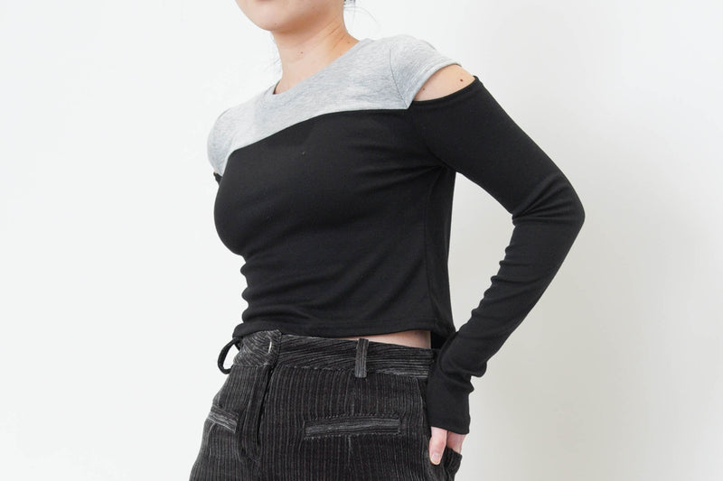 Black patchwork crop top in cut out shoulders