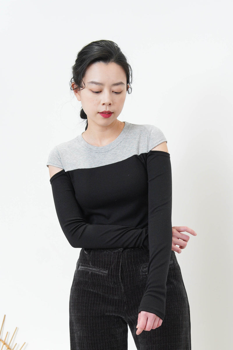 Black patchwork crop top in cut out shoulders