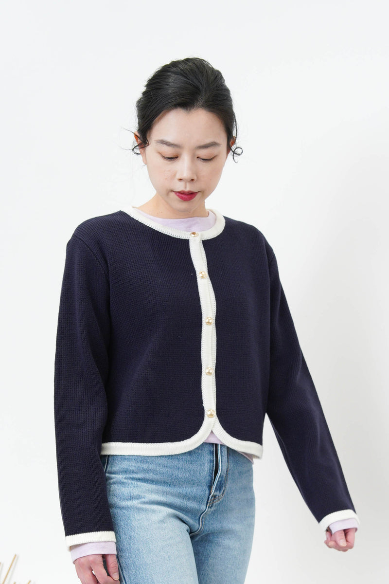 Navy outlined cardigan in round hem